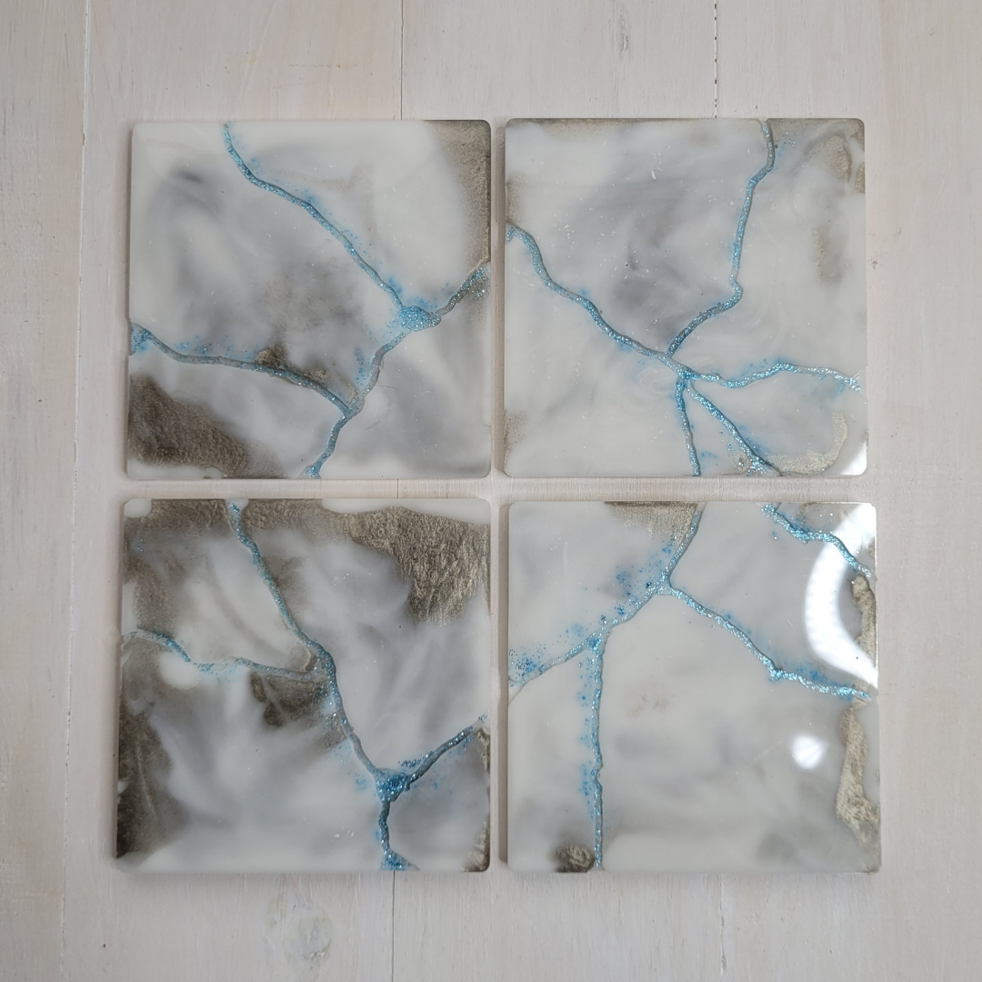 Set of 4 white and silver coasters